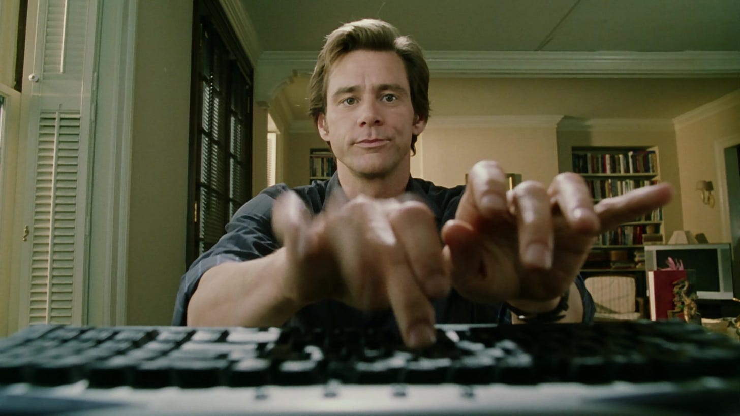 Jim Carrey in the movie Bruce Almighty typing really fast on a keyboard