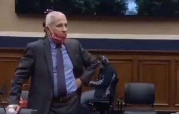 fauci takes mask off after hearing