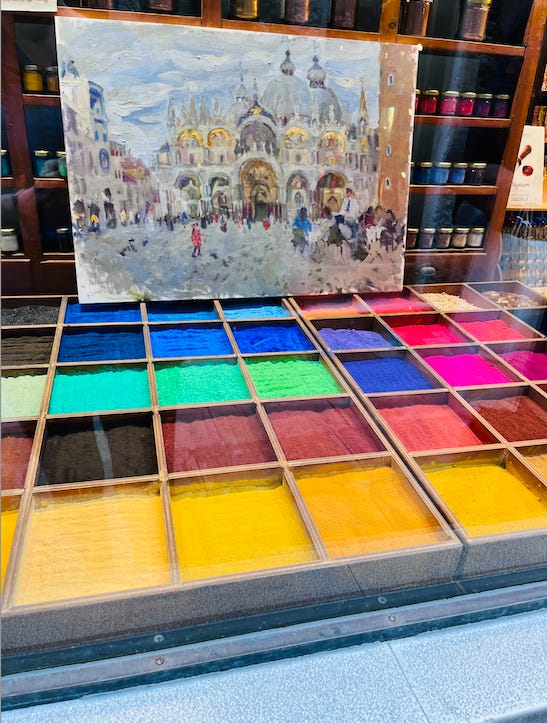 Brightly colored mineral pigments in shop window