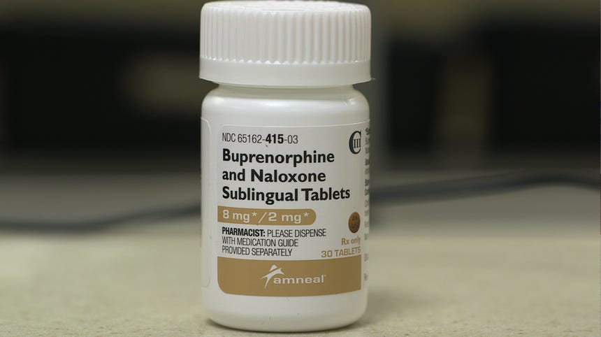 A pill bottle with a label that readds, Buprenorphine and Naloxone Sublingual tablets