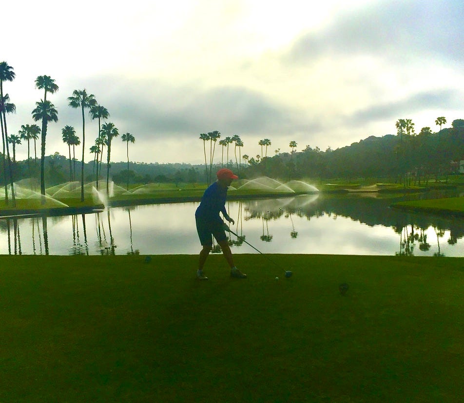 A person playing golf near water

AI-generated content may be incorrect.