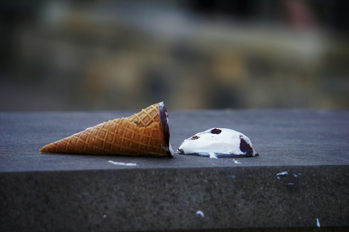 A fallen ice cream cone. A fallen ice cream cone.