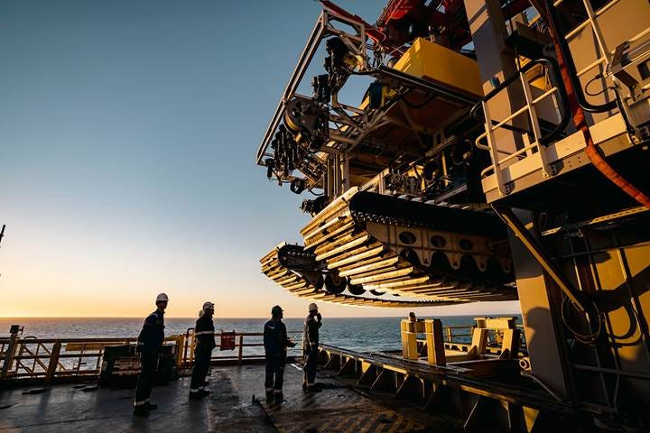 Mining robot on board a ship about to be lowered to the seafloor