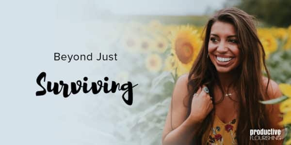 A woman with dark, long hair is standing ina field of sunflowers, smiling. Text Overlay: Beyond Just Surviving