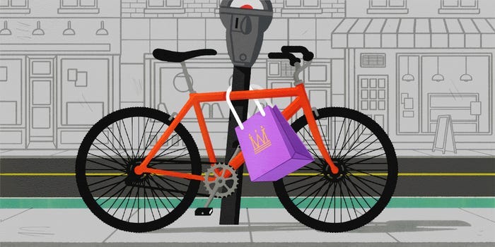 A shopping bag locking a bike to a parking meter