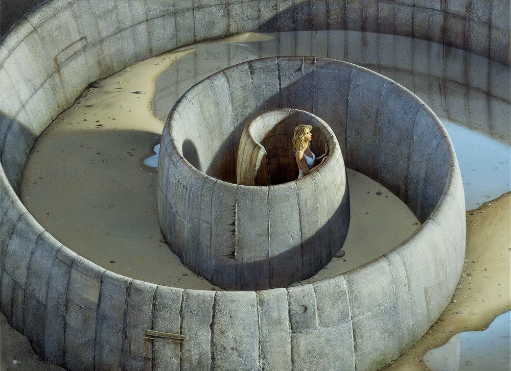 Light cuts across a stone spiral leaving a sharp contrast of shadow and light on the curving walls. A blonde woman rests both hands on the concrete barrier as she peers over, her face illuminated. The wall wraps around her in a tight spiral, the same curve as an ammonite fossil as it unwinds from the origin where she stands. The damp sand is littered with smooth rocks and eventually covered with standing water that reflects the rectangular casted segments of the concrete walls.