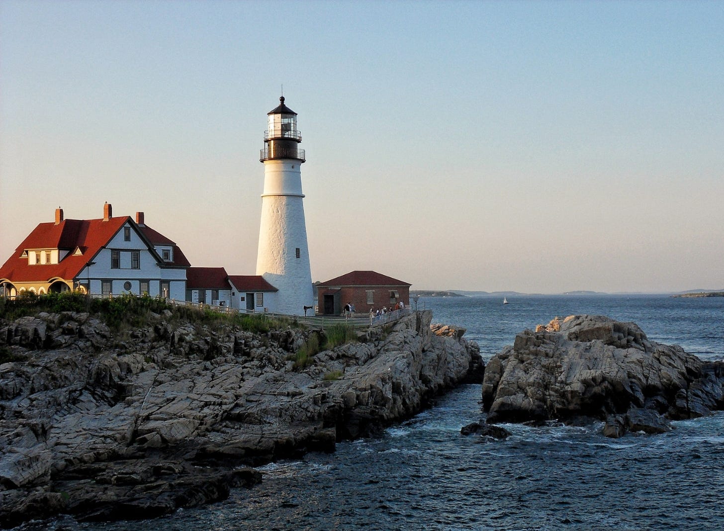 House and Lighthouse on a rock