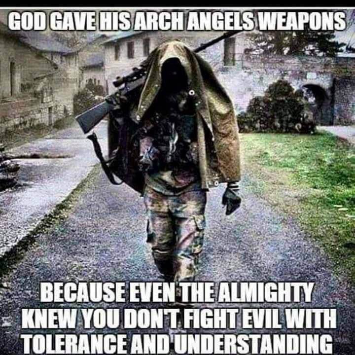 A creepy meme with a paramilitary-looking person wearing camo with face covered with mask and coat, rife and weapons strapped on their back, walks through a gray background with stone buildings behind them. Caption: God gave his arch angels weapons because even the almighty knew you don't fight evil with tolerance and understanding