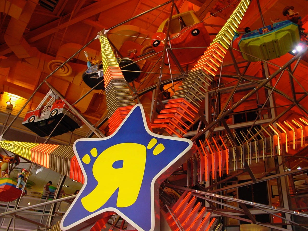 A photograph of the Toys “R” Us Ferris wheel at their flagship store in Times Square, New York City, taken on July 20th, 2002