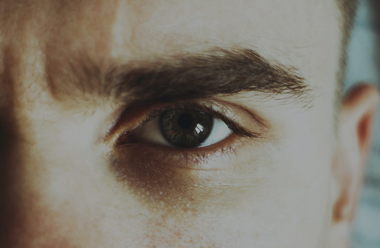 A closeup of a man's left eye