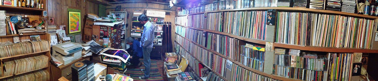 A panoramic view of one of the rooms of the Ark-Hives showing thousands of LPs, 45s, posters and more