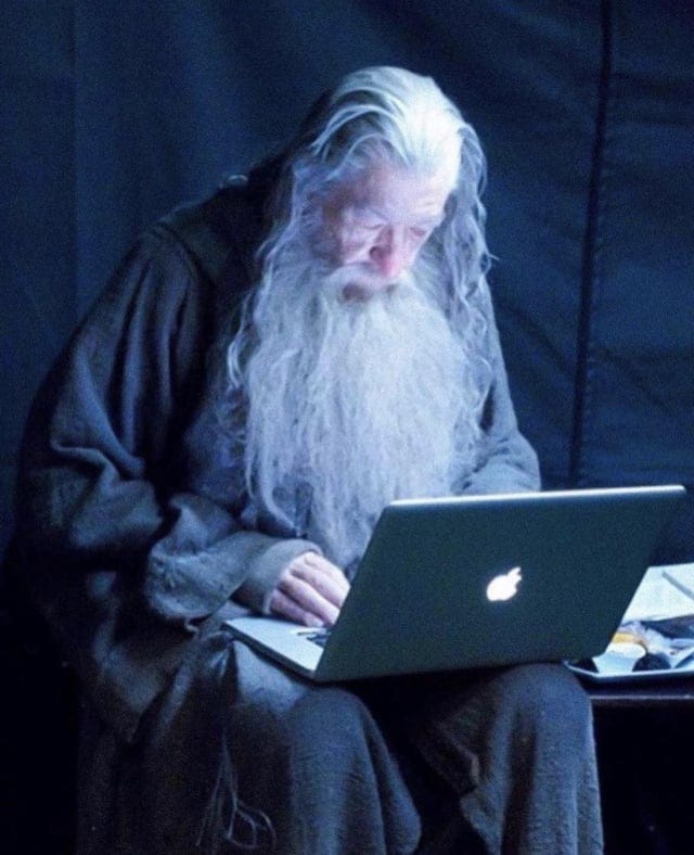 r/Moviesinthemaking - a person with a long white beard using a laptop