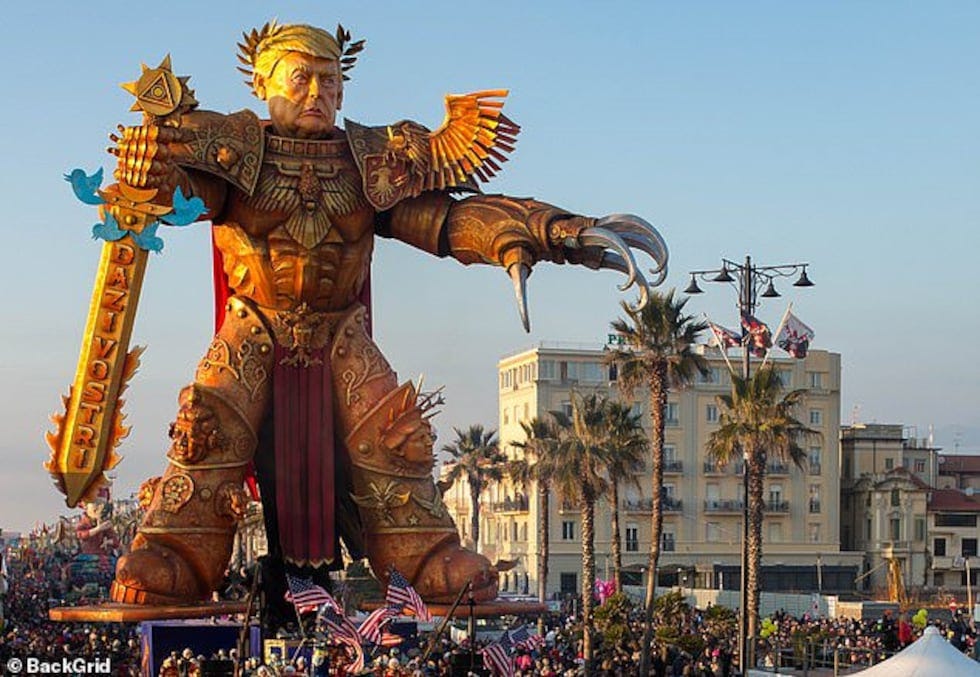 Giant sword-wielding Trump statue paraded through Italian town