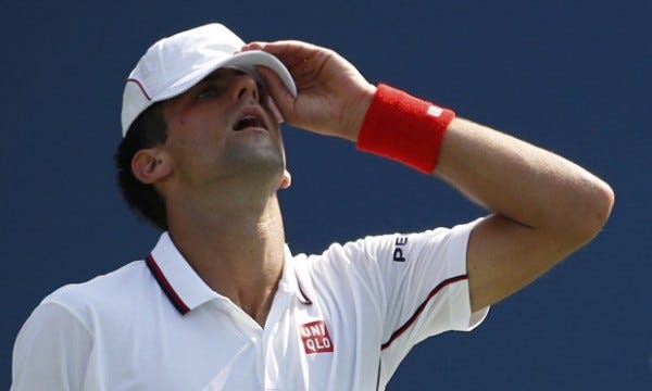 novak djokovic reacts to losing for kei nishikori 2014 tennis