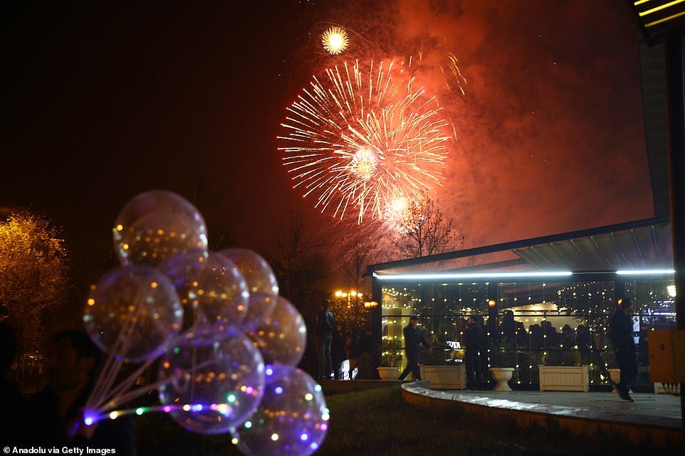 BAKU: Fireworks light up the night sky over the city to welcome the New Year 2025 as people gather to watch fireworks during the New Year celebrations in Baku, Azerbaijan on January 1, 2025