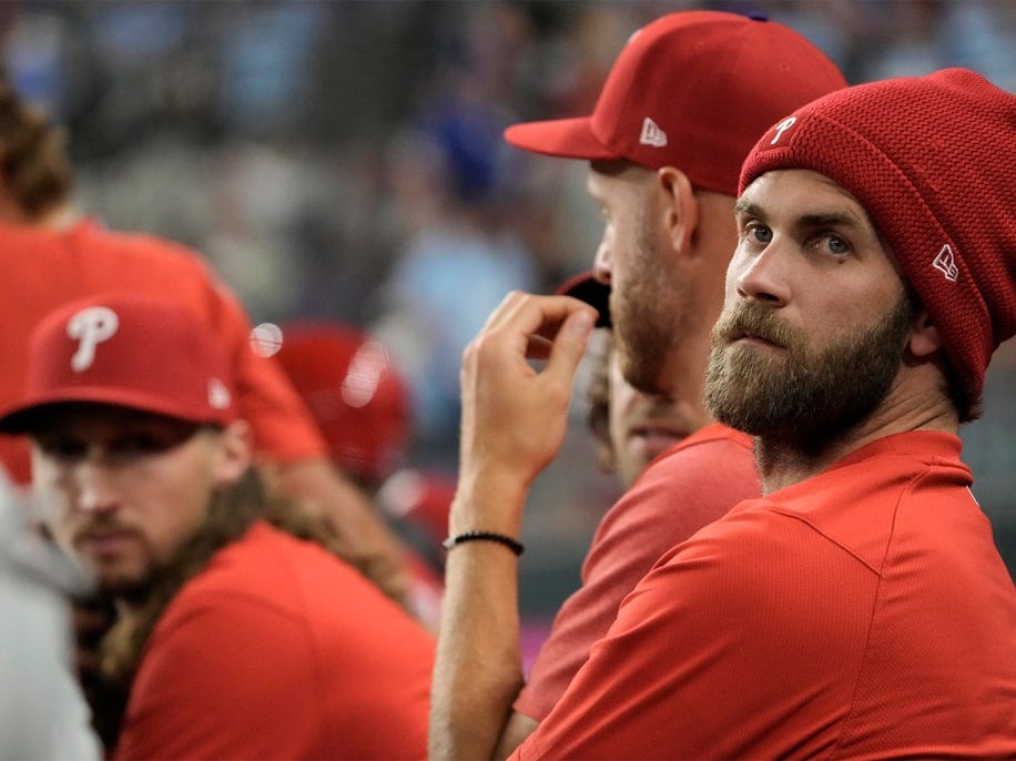 Bryce Harper of the Philadelphia Phillies looks on during the eighth inning against the Texas Rangers