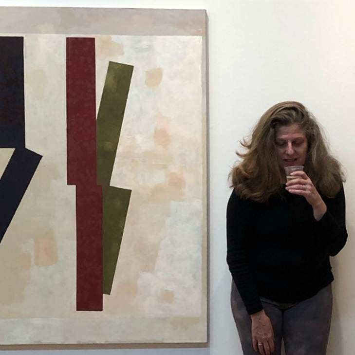 A person standing next to a painting

AI-generated content may be incorrect.