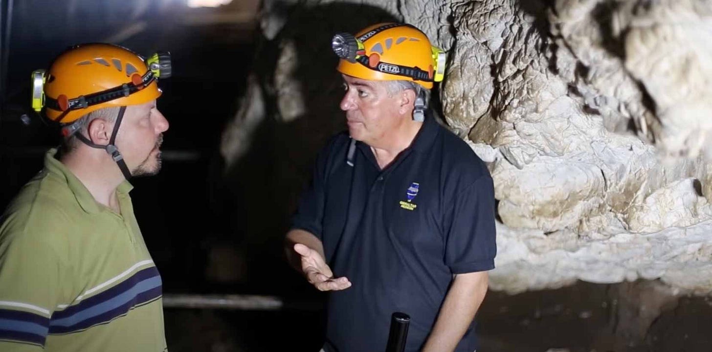 John Hawks and Clive Finlayson inside a cave