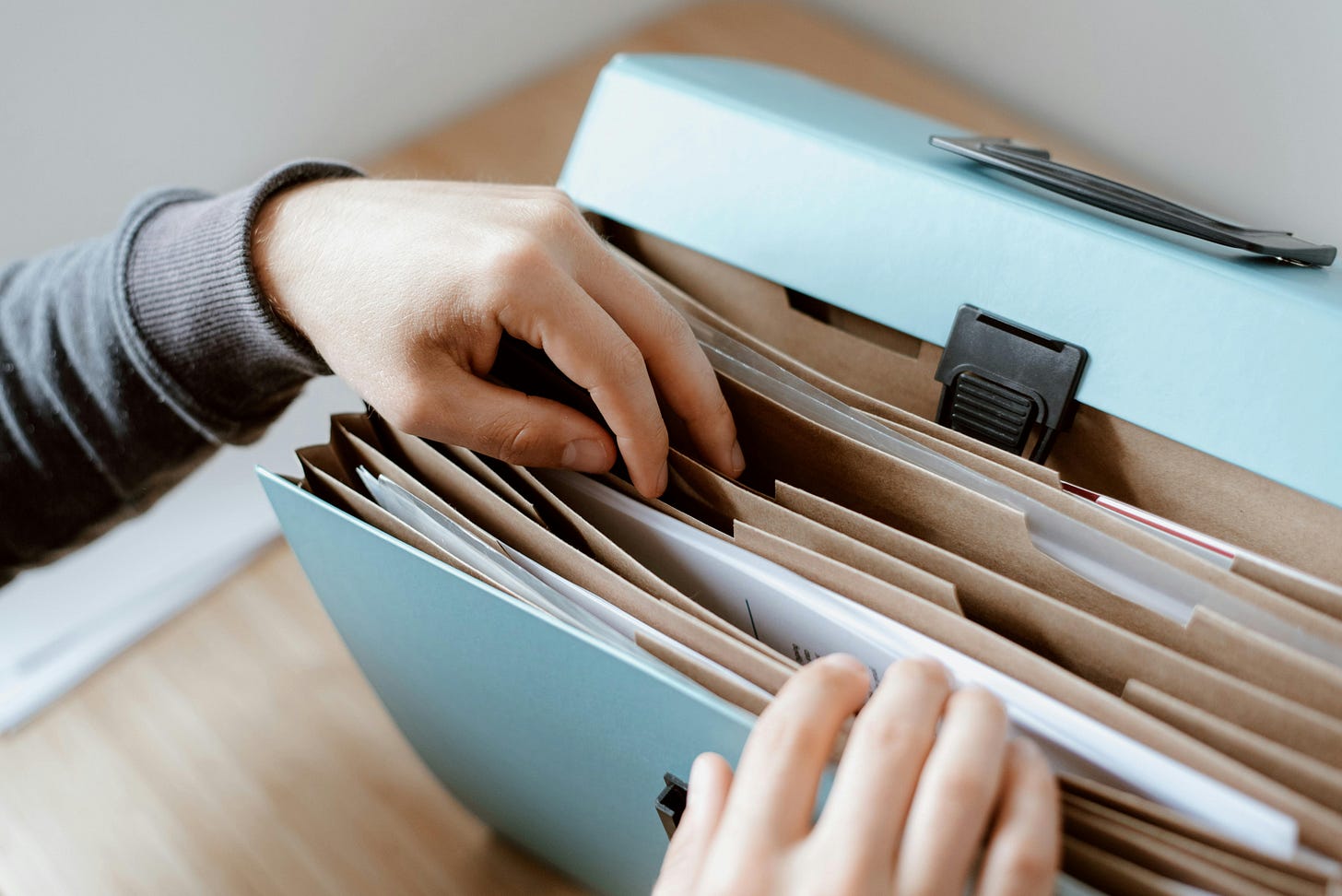 Accordion folder with papers in it. Accordion folder with papers in it.