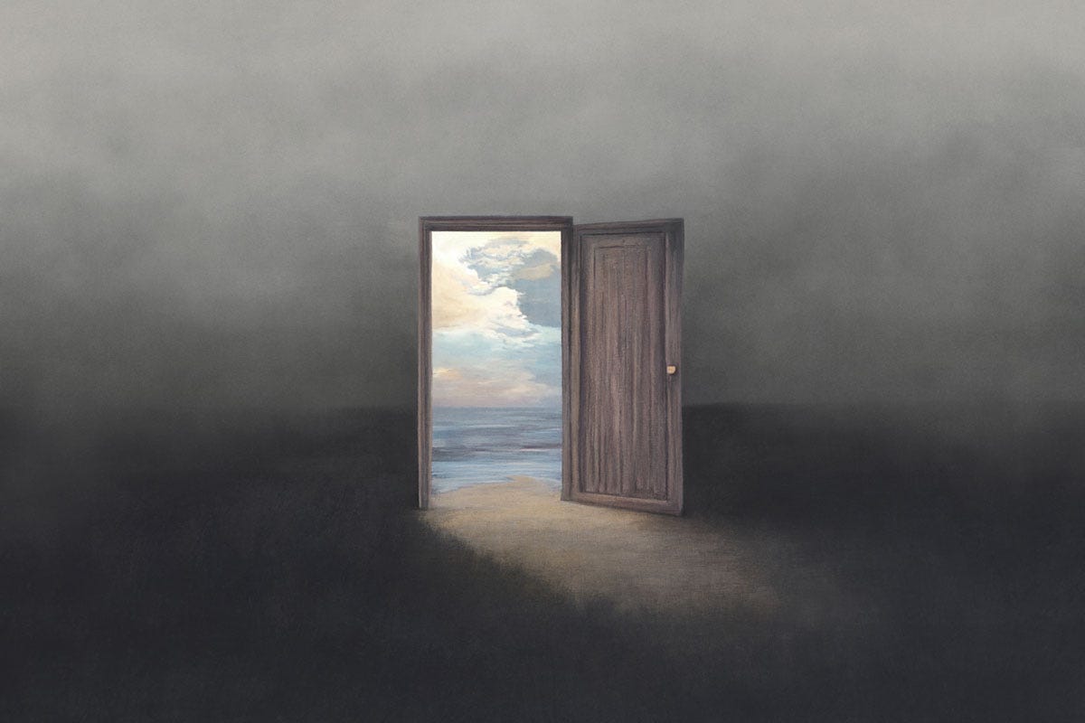 Door in Dark Room Opening to Blue Skies and Ocean
