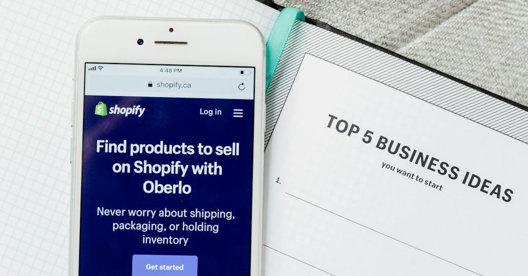 white samsung android smartphone on white paper white samsung android smartphone on white paper