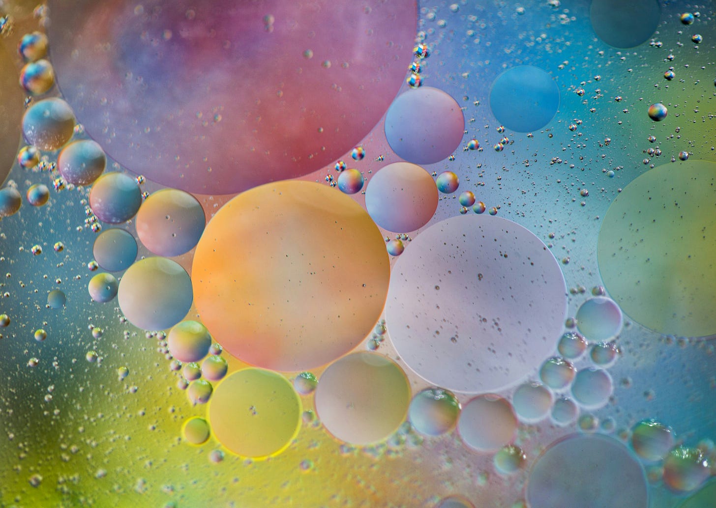 a picture of different size and colour bubbles