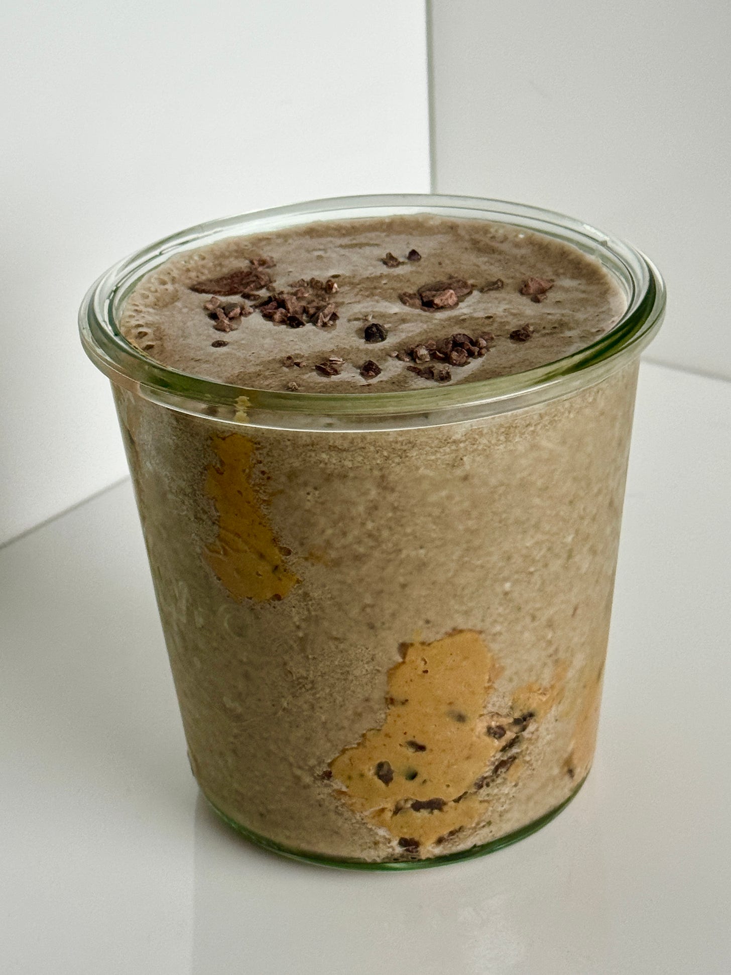 Healthy chocolate peanut butter smoothie with cacao nibs