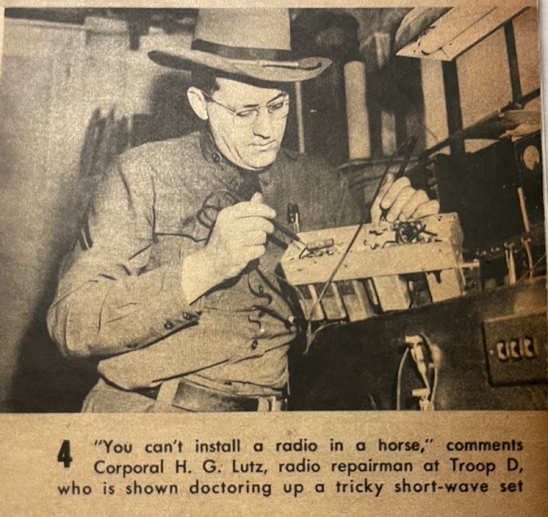 A picture of a state trooper in 1943 soldering a radio.