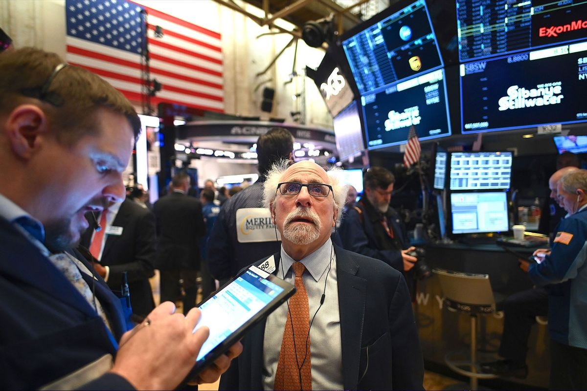 Traders work during the opening bell at the New York Stock Exchange (NYSE) on February 28, 2020 at Wall Street in New York City. - Losses on Wall Street deepened following a bruising open, as global markets were poised to conclude their worst week since 2008 with another rout. (JOHANNES EISELE/AFP via Getty Images)