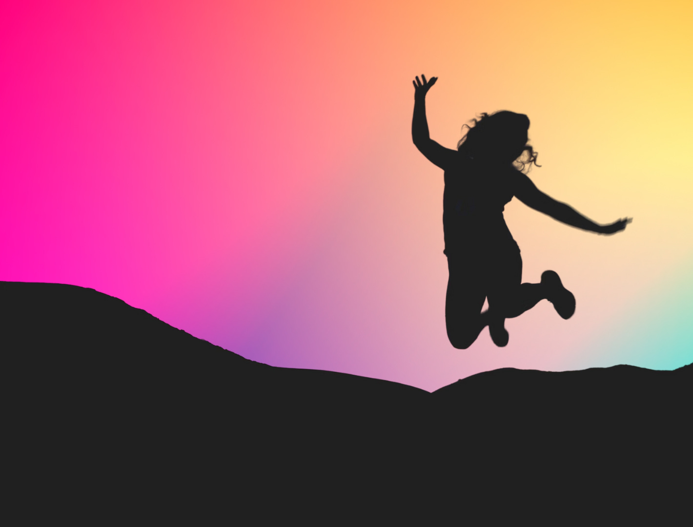 A woman jumping because she has found the balance between Hedonic and Eudaimonic happiness