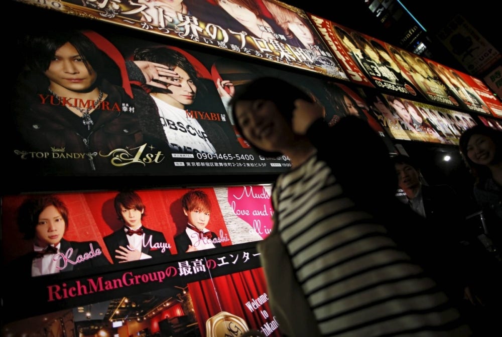 The illuminated advertising board of a host club in Tokyo's Kabukicho entertainment district. The bill approved by the government on Friday aims to ban hosts from emotionally manipulating customers into making excessive purchases — a common tactic in the industry.