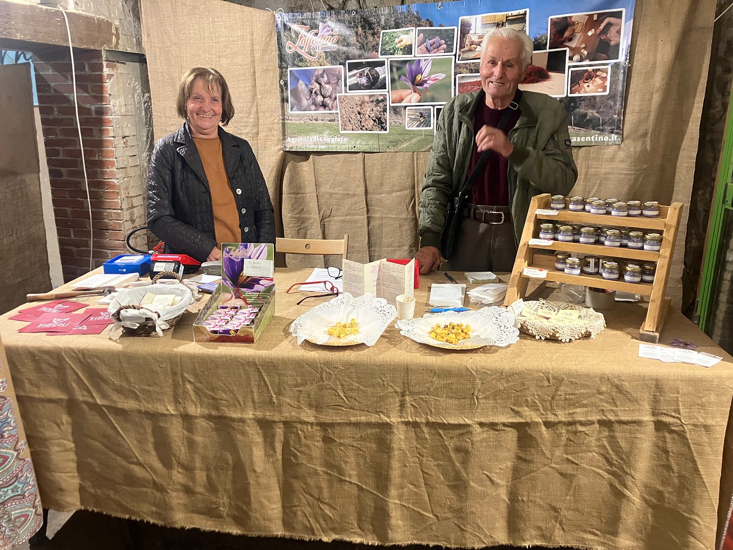 Buying saffron at a cento gusti stall in Anghiari