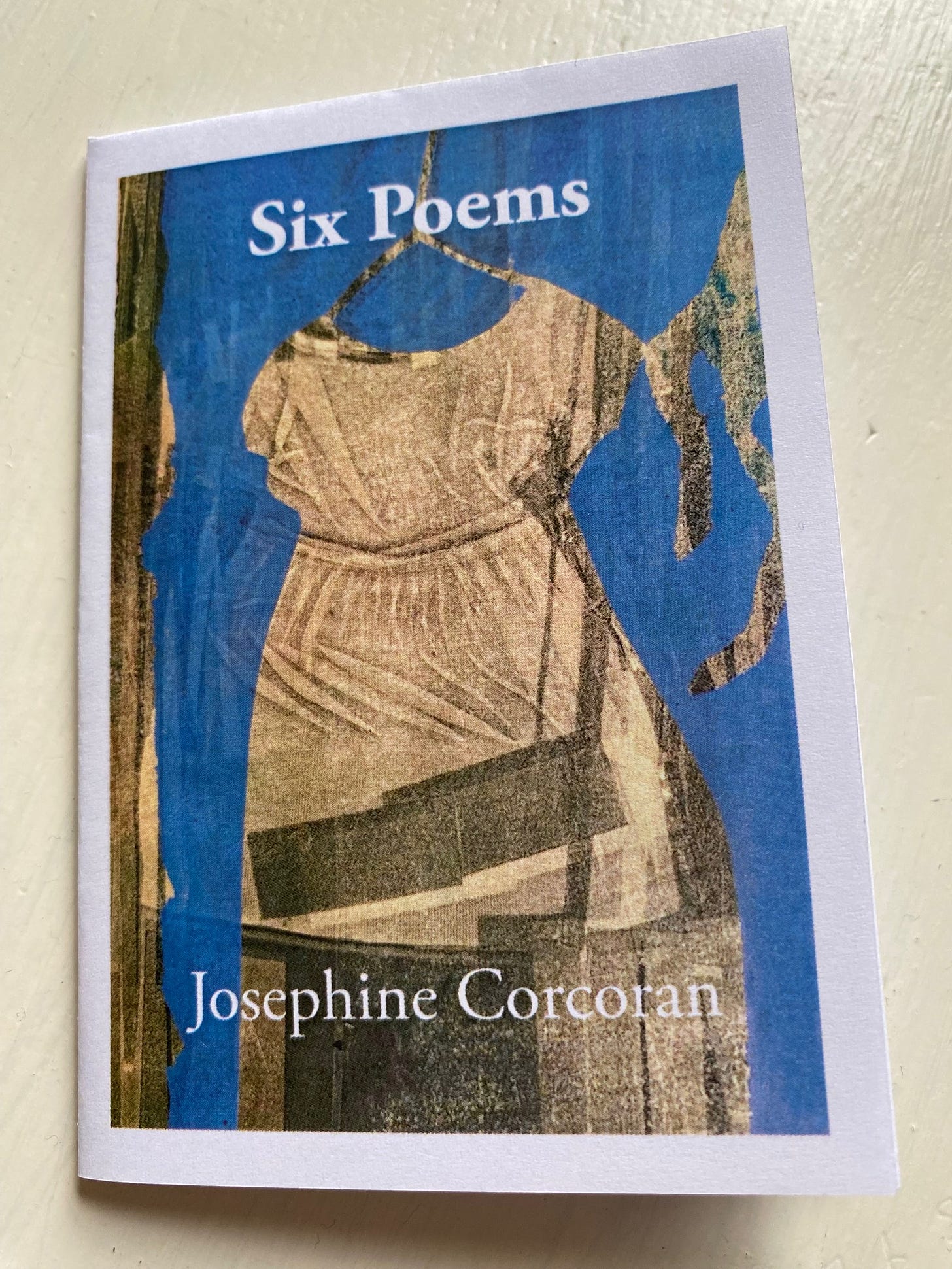 Six Poems by Josephine Corcoran featuring a section from an itaglio print by Pauline Scott-Garrett, a child's white dress on a blue background