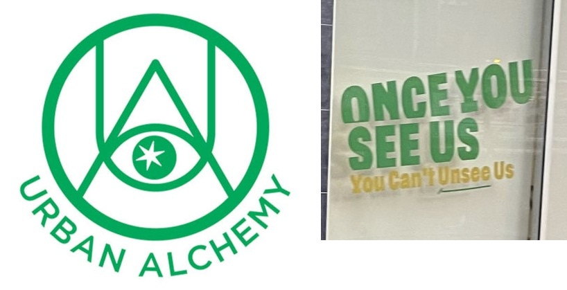 Urban Alchemy's logo which consists of a triangle with a eye in the middle. On the right of the logo is a picture of a window of Urban Alchemy's offices. The window says "Once you see us, you can't unsee us"