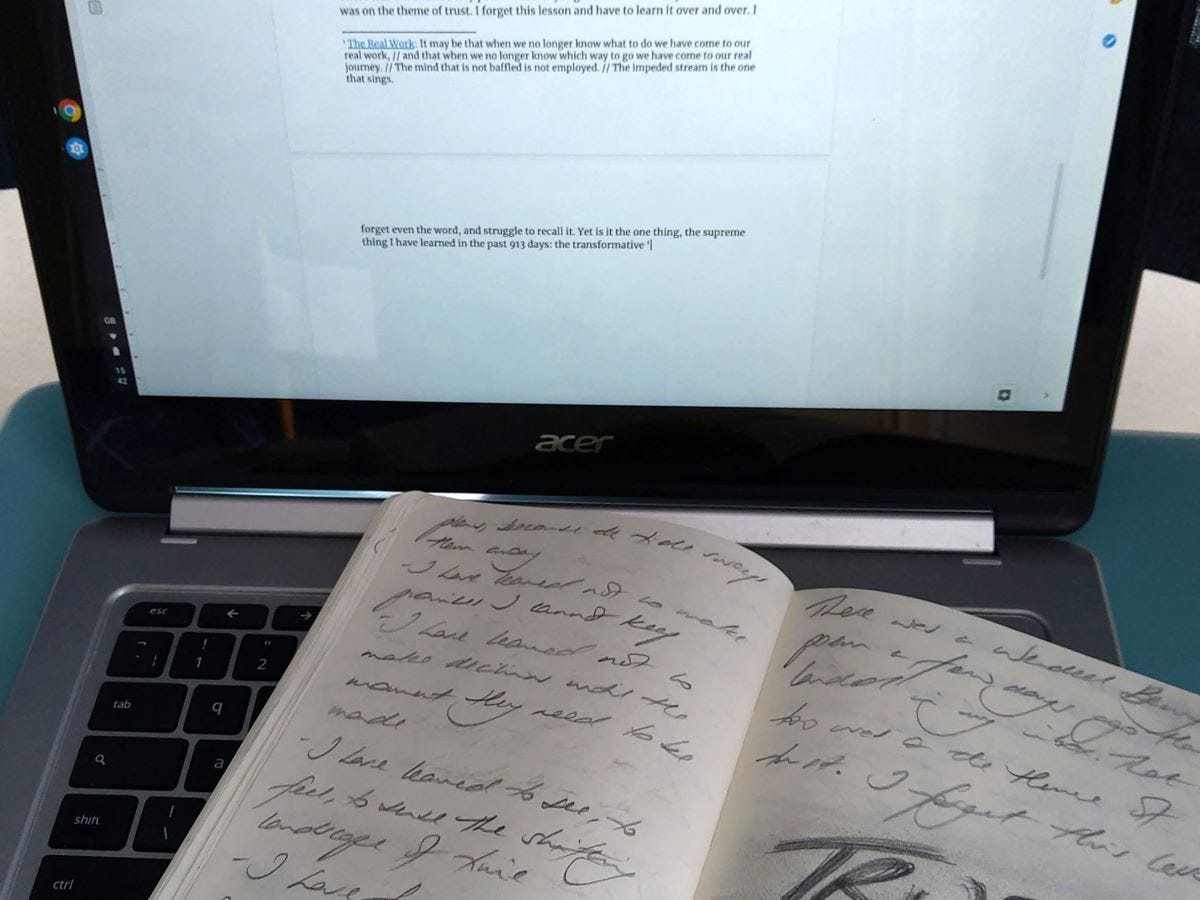 Handwritten journal on a laptop keyboard, with entries transcribed into an online document