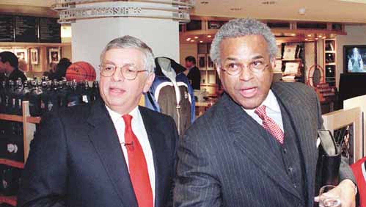 NBA commissioner David Stern and Players Union Director Billy Hunter stand together during a party at the NBA Store in New York to celebrate the signing of the collective bargaining agreement.