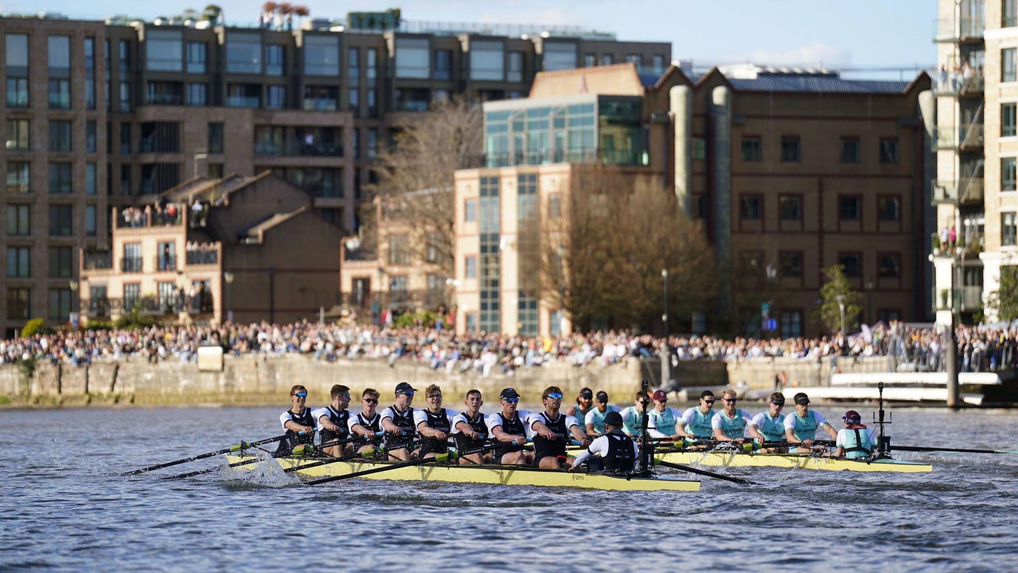 Oxford and Cambridge rowing teams on the Thames