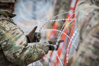 Concertina wire being used as a border deterrent