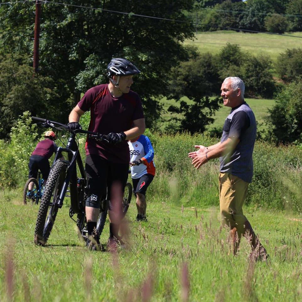 MTB coach Tony Doyle, aka the Jedi, coaching a group of MTB riders