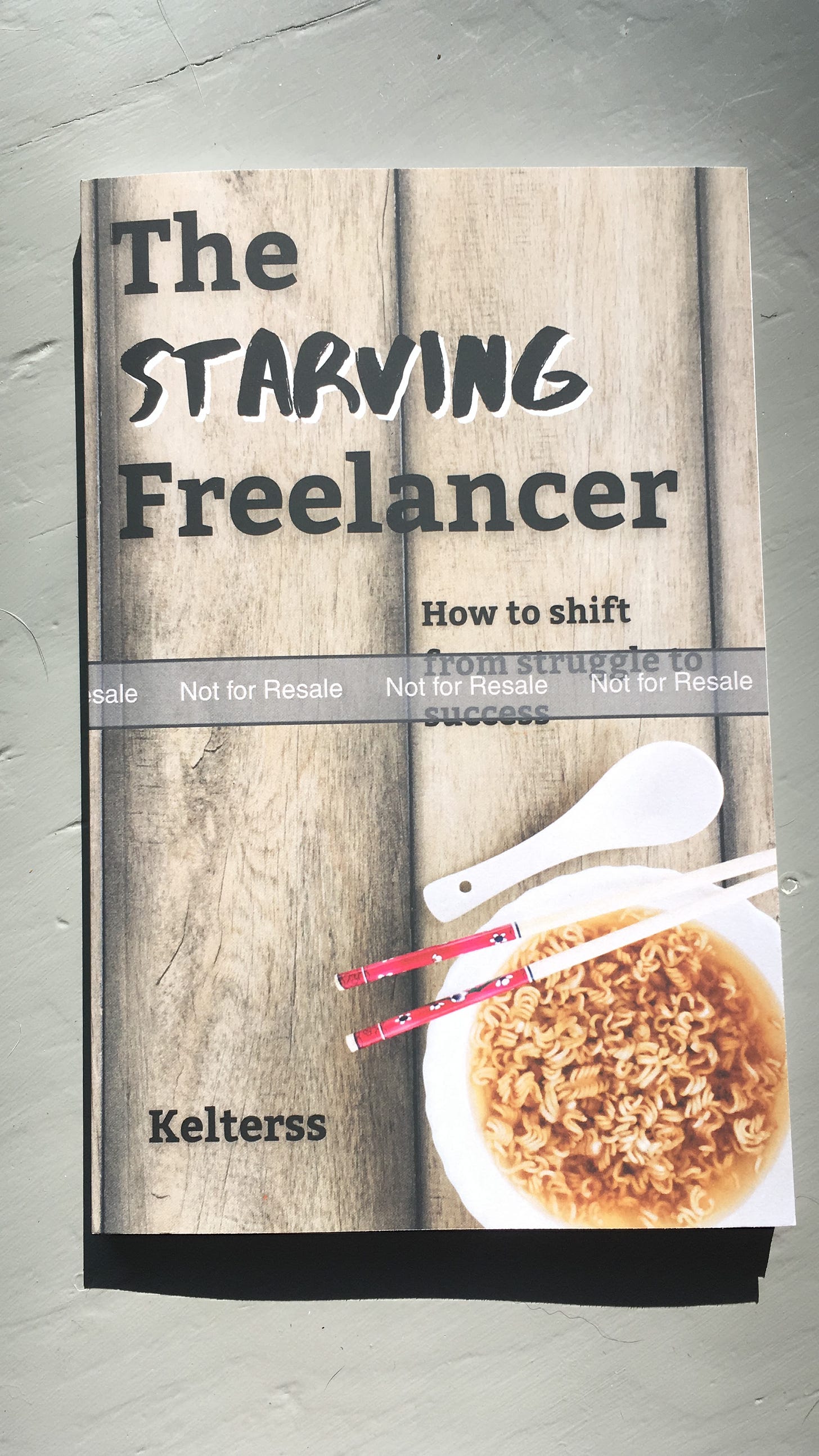 The front of my upcoming book, The Starving Freelancer: How to shift from struggle to success