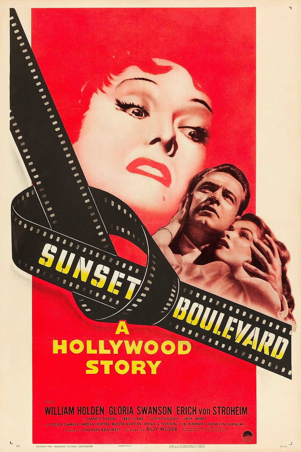 A predominantly red illustration of an older woman's wrathful, enraged face looming large over a frightened younger couple; the title 'Sunset Boulevard' is displayed over a strip of celluloid film tied in a knot.