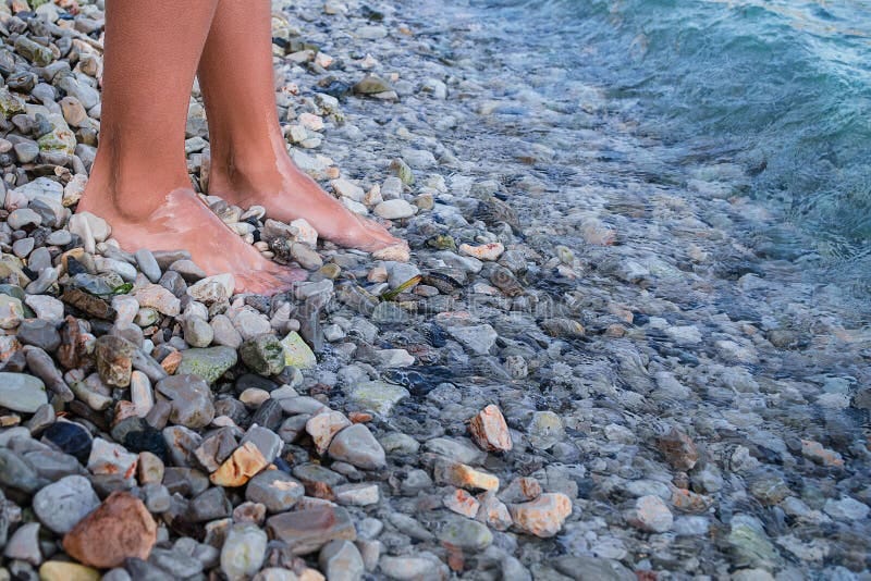 Closeup of a Girl Bare Feet Walking on Stones Rock Stock Image - Image of  girl, pebble: 168745363