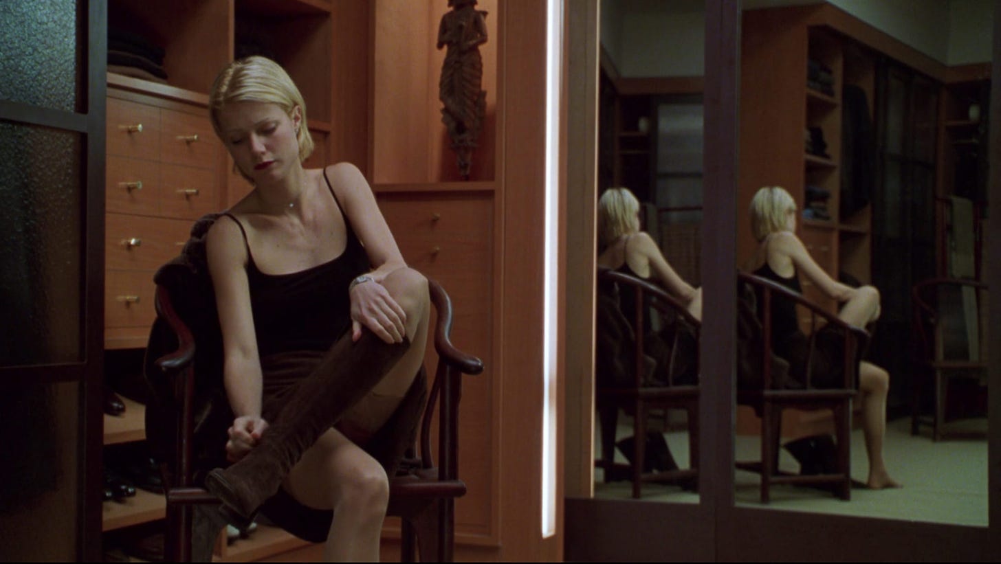 Gwyenth Paltrow taking off boots in her closet the film A Perfect Murder