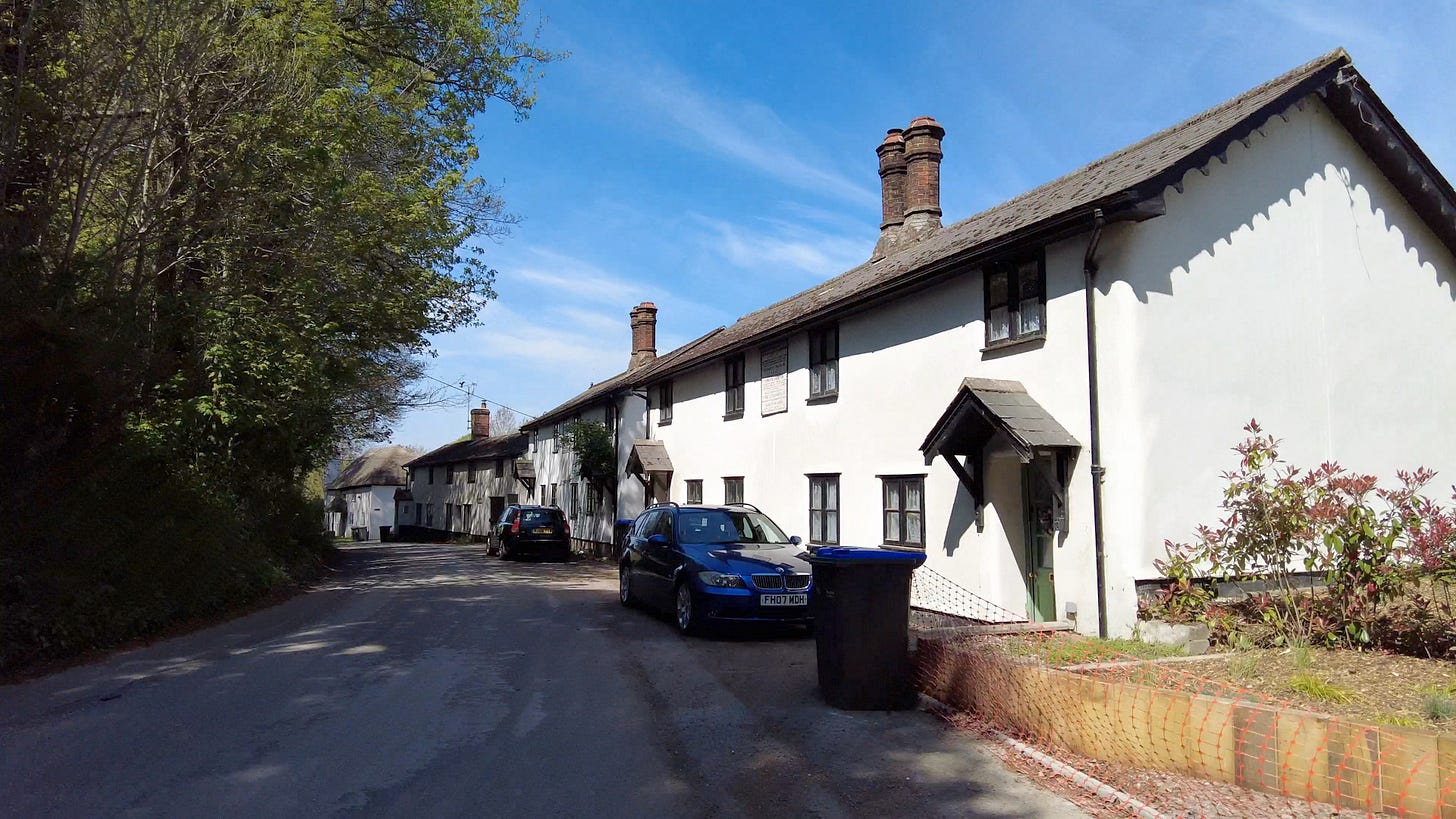 The white painted Flood Cottages in Orcheston, Wiltshire. Image: Roland Millward