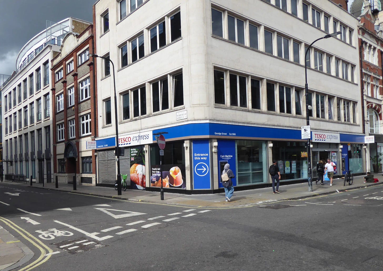View from street of Goodge Street Tesco on the corner with Whitfield Street, Fitzrovia, London,