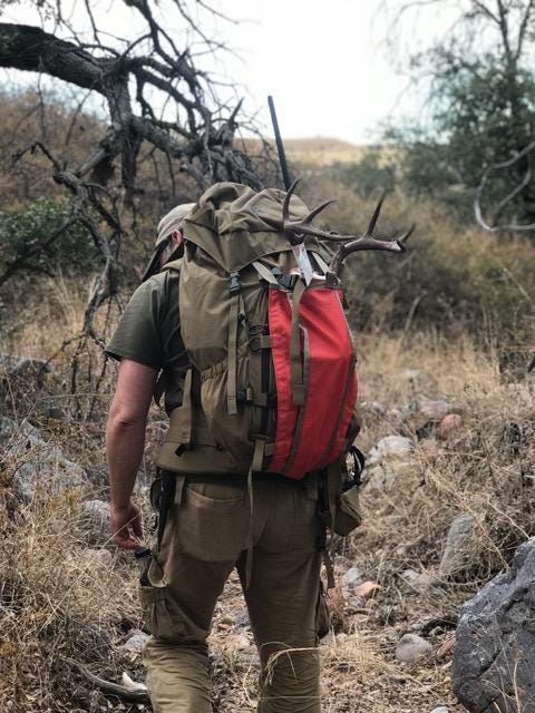 Hank packing out the Coues deer in Arizona. 