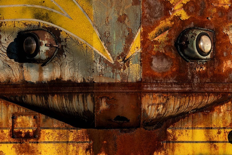 Photo of a rusty locomotive.