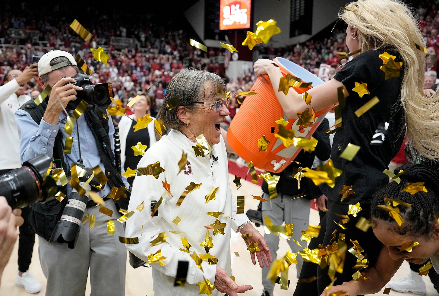 PALO ALTO, CALIFORNIA - JANUARY 21: Head coach Tara VanDerveer of the Stanford Cardinal celebrates with her player Cameron Brink #22 after Stanford defeated the Oregon State Beavers 65-56 at Stanford Maples Pavilion on January 21, 2024 in Palo Alto, California. Tara VanDerveer recorded her 1,203 NCAA career victory passing Mike Krzyzewski with 1,202 NCAA career wins. (Photo by Thearon W. Henderson/Getty Images)