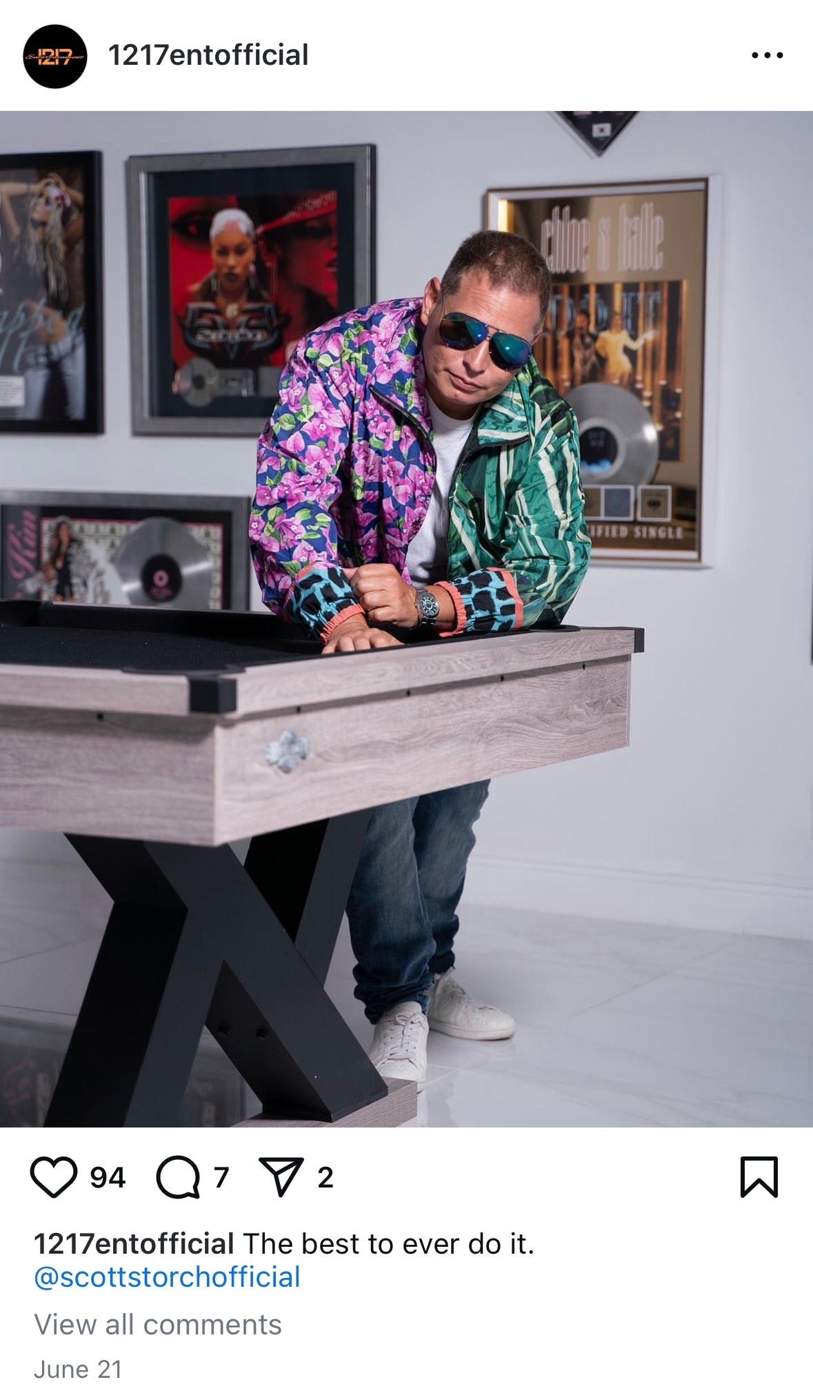 Instagram post from 1217entofficial that says "The best to ever do it. @scottstorchofficial." Storch himself is leaning over a billiard table with sunglasses and a floral shirt. Behind him are a bunch of his platinum records that have nothing to do with 1217 Entertainment.