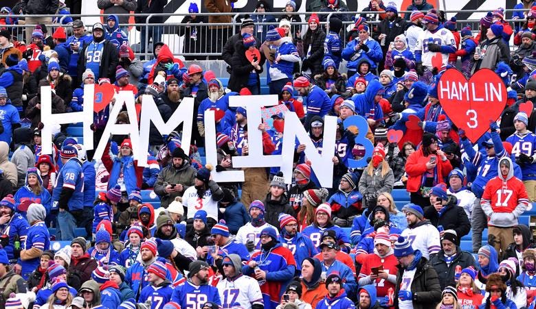 Buffalo Bills fans show support for Damar Hamlin before a game against the New England Patriots at Highmark Stadium in Orchard Park, New York.   Mark Konezny-USA TODAY Sports